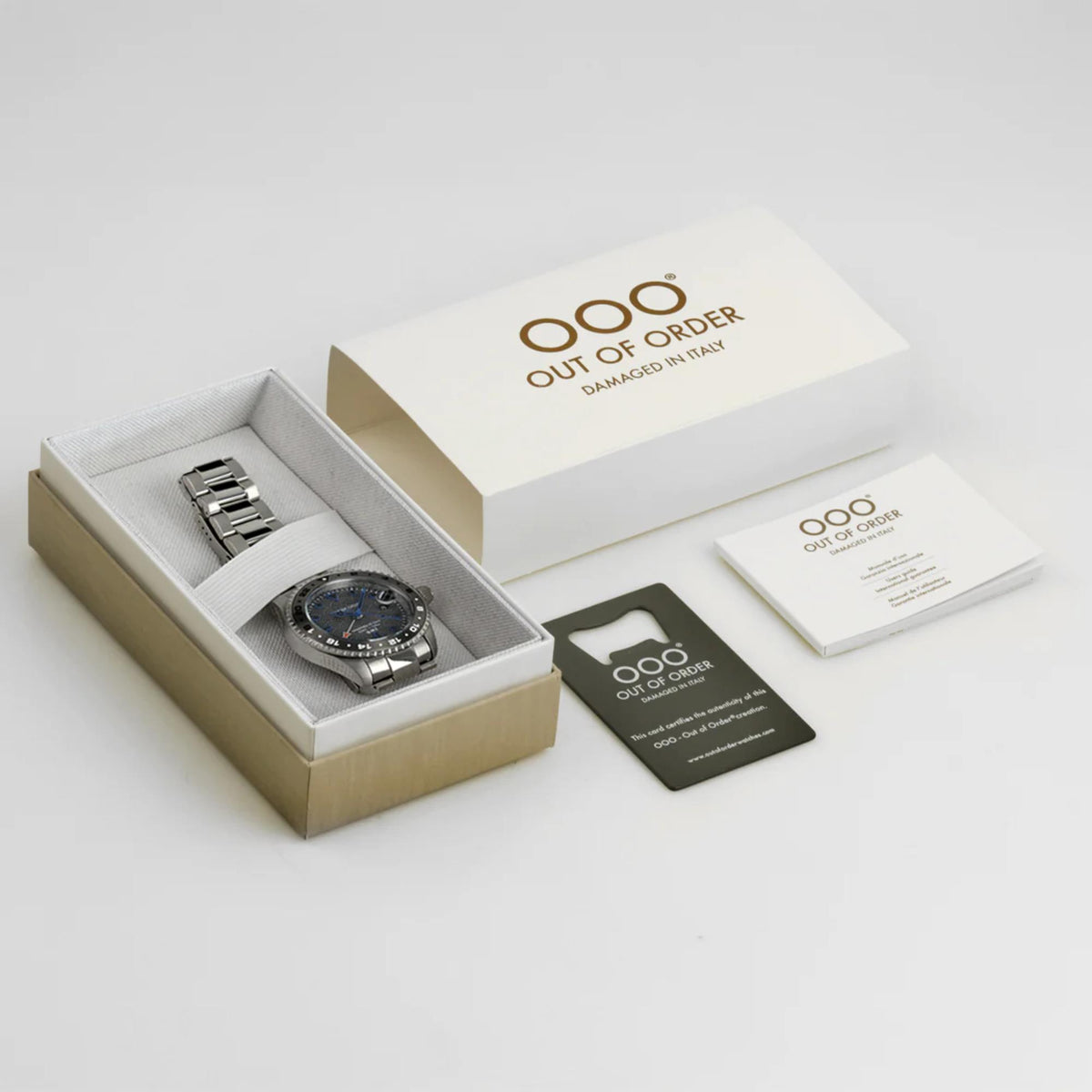 GMT watch in presentation box with warranty cards and spare documents, product layout
