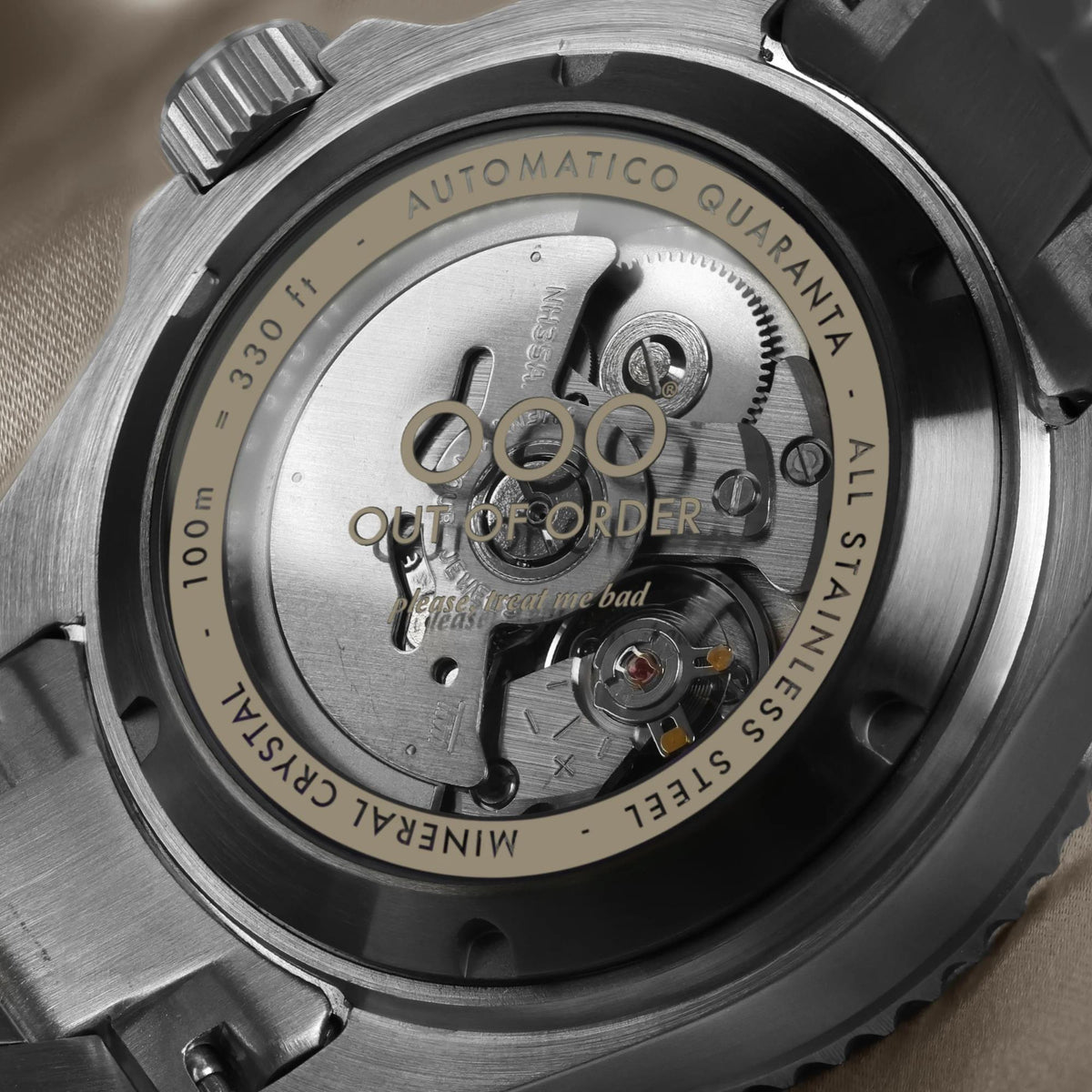 Men's automatic skeleton wristwatch with steel case and visible movement, sunburst sand dial