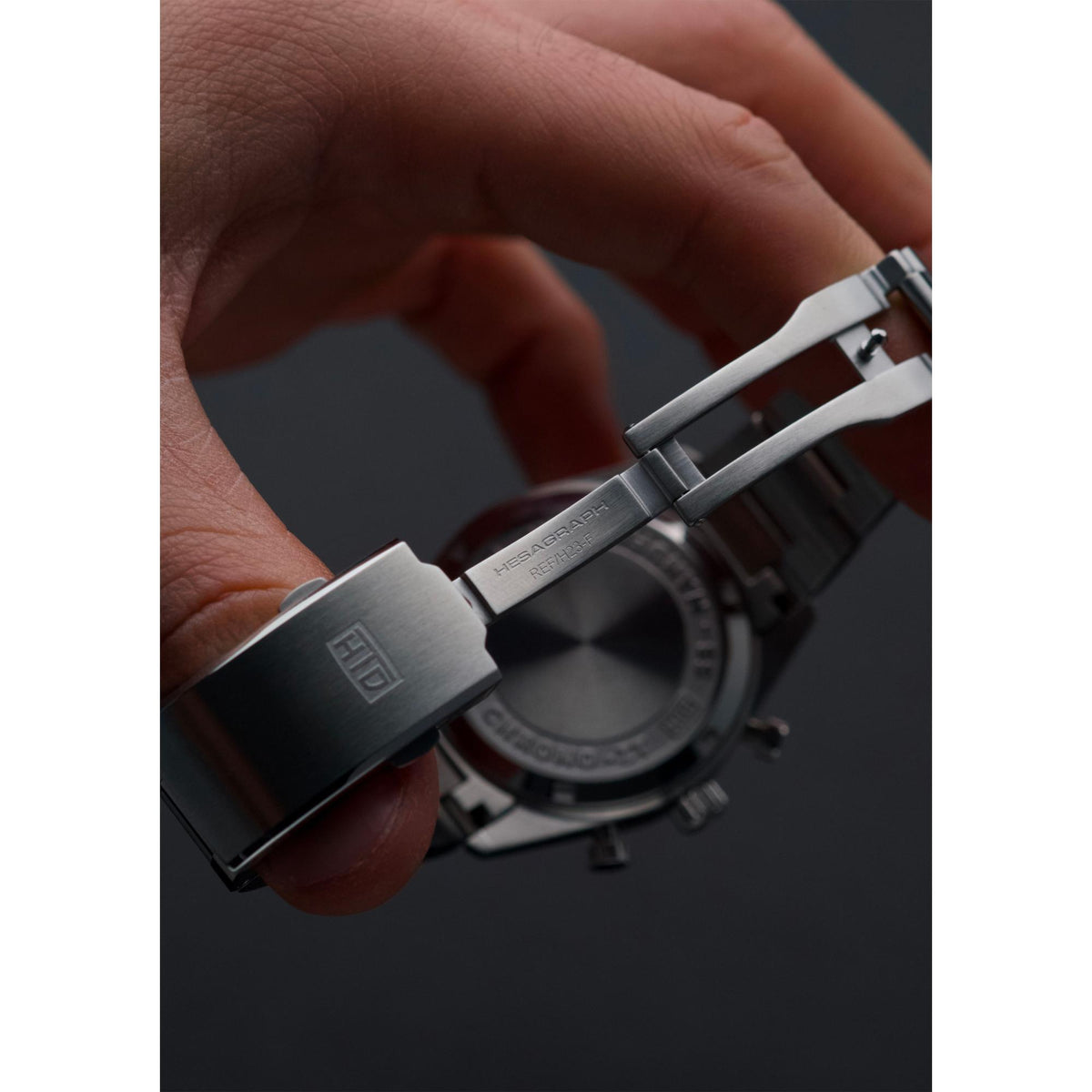 Men's chronograph watch strap and clasp with brushed steel case back