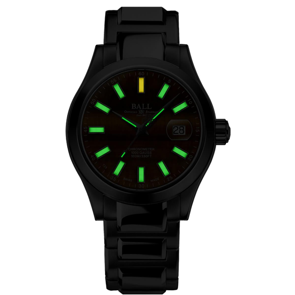 Ball Engineer III automatic chronometer watch showcasing intense green tritium lume markers and numerals in low light