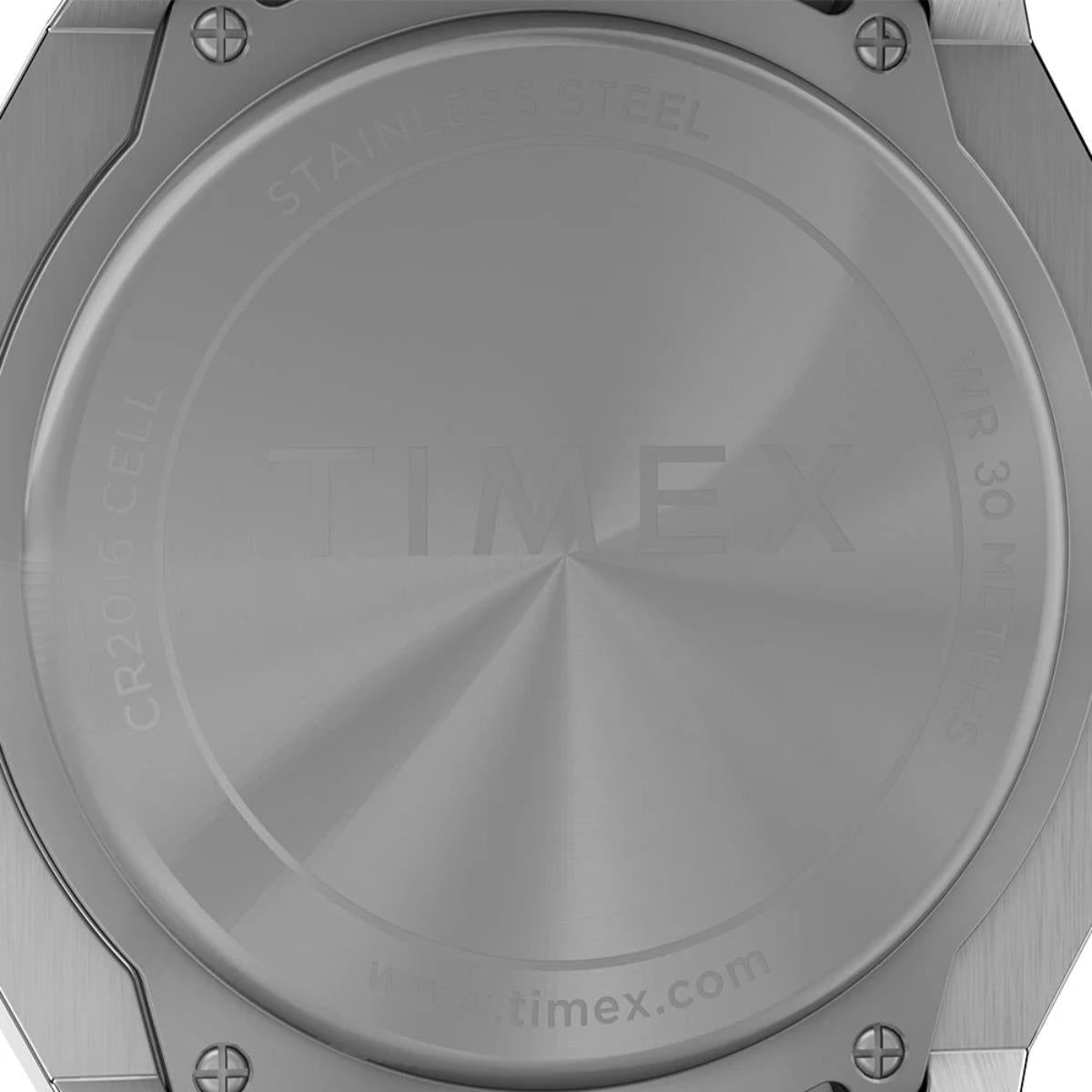 Timex watch case back close-up with engraved TIMEX and timex.com on steel
