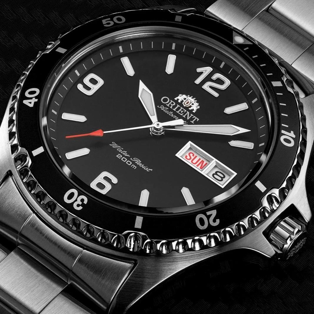 Orient automatic dive watch with black dial, silver bezel, day-date window, steel bracelet
