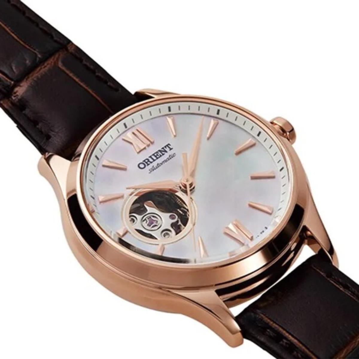 Women’s automatic watch with silver open-heart dial, rose-gold case, brown leather strap
