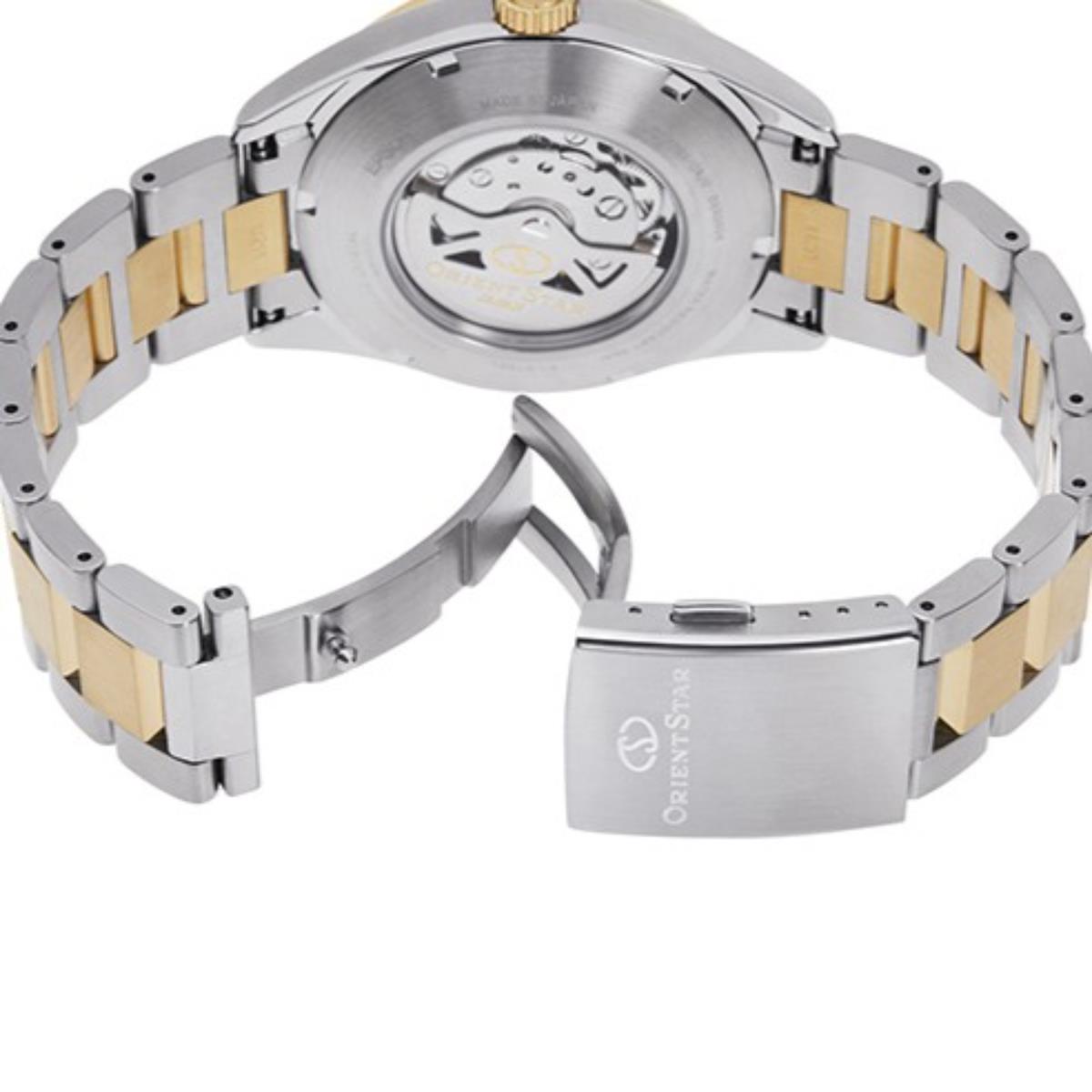Men's automatic watch caseback with visible movement, steel and gold link bracelet