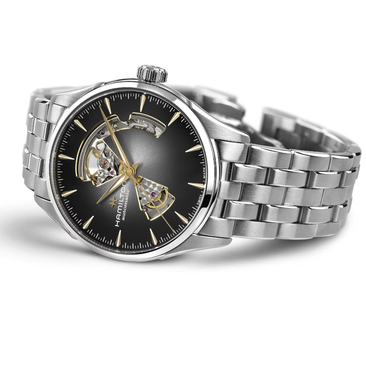 Steel automatic watch with black dial, open-heart skeleton movement, crown at 3 o'clock