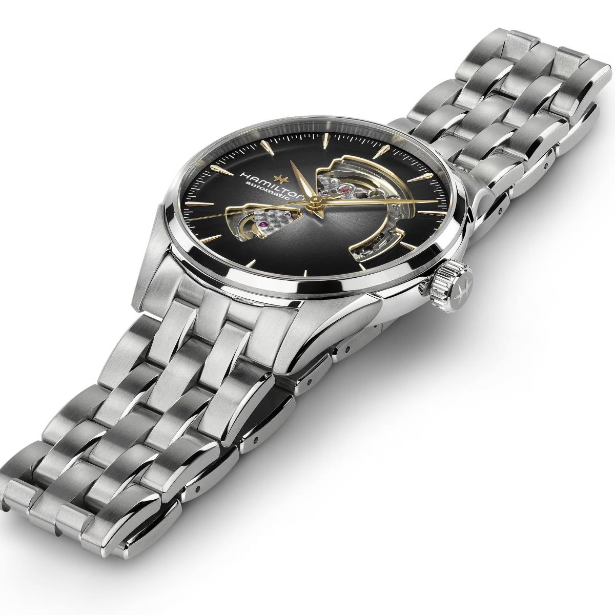 Steel bracelet automatic watch with black open-heart dial and exposed movement detail