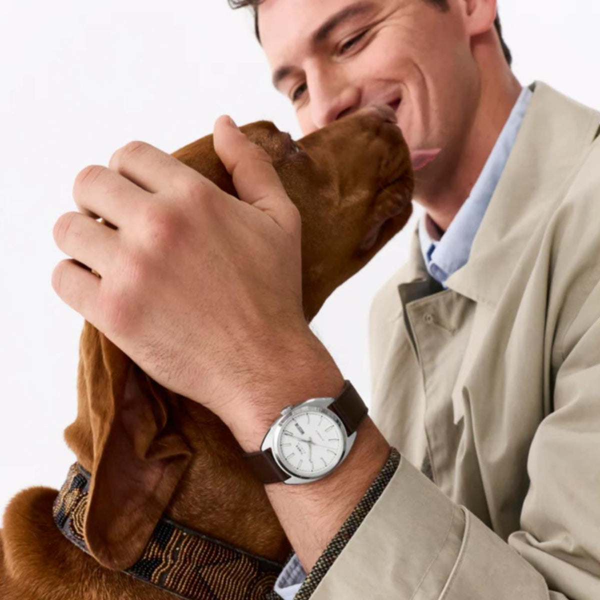 Timex Marlin TW2Y65200 automatic watch lifestyle shot on wrist with dog