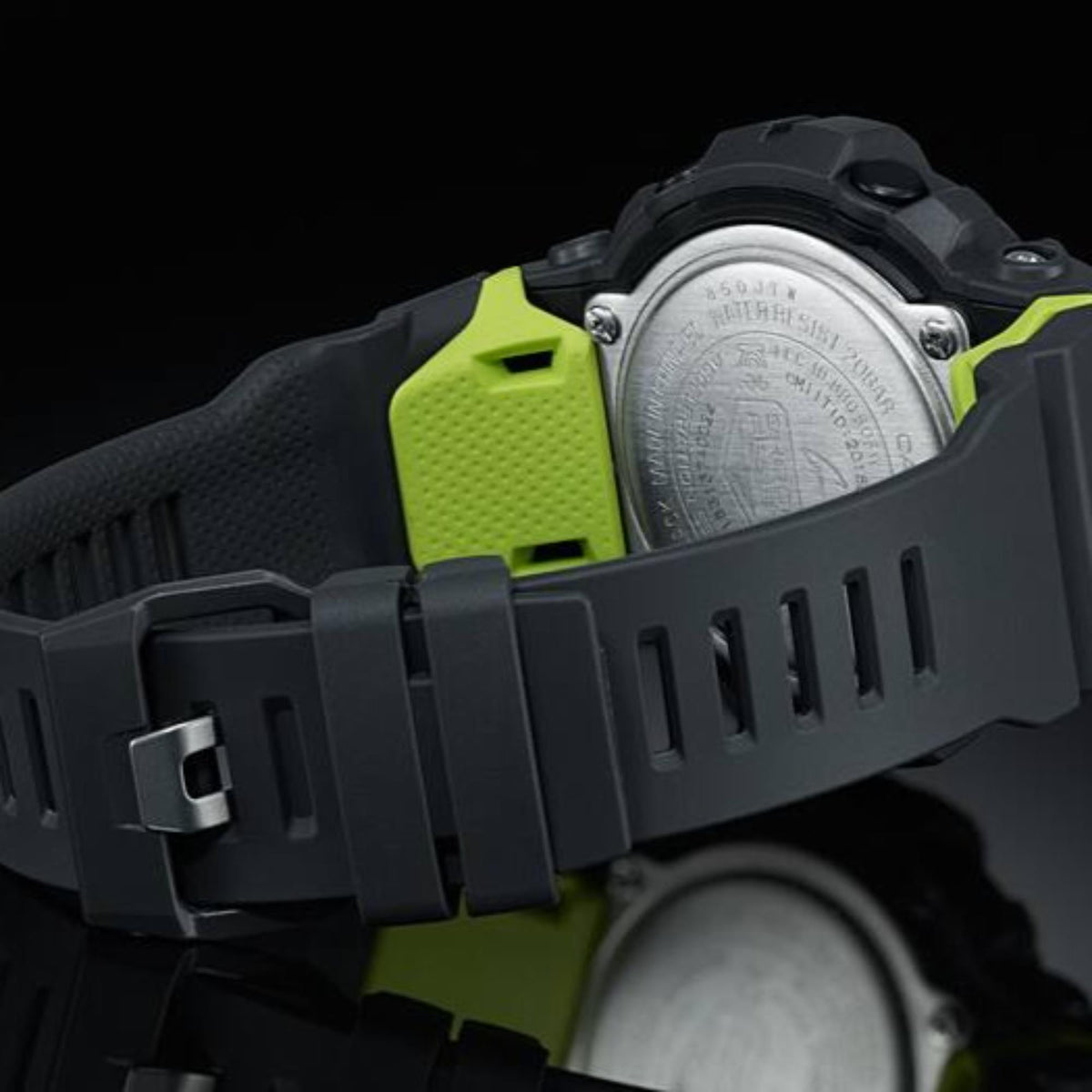 Angled rear studio shot showcasing the buckle clasp and textured inner strap wings of the Casio G-Squad GBD-800-8ER timepiece