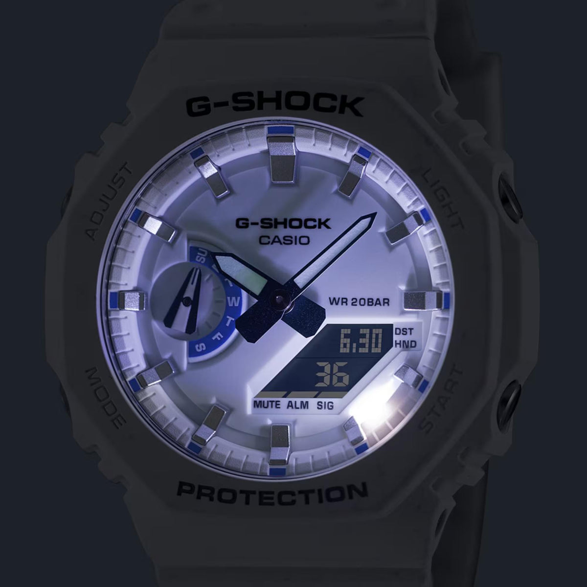 Dark resin G-Shock watch face with blue analog hands and digital window