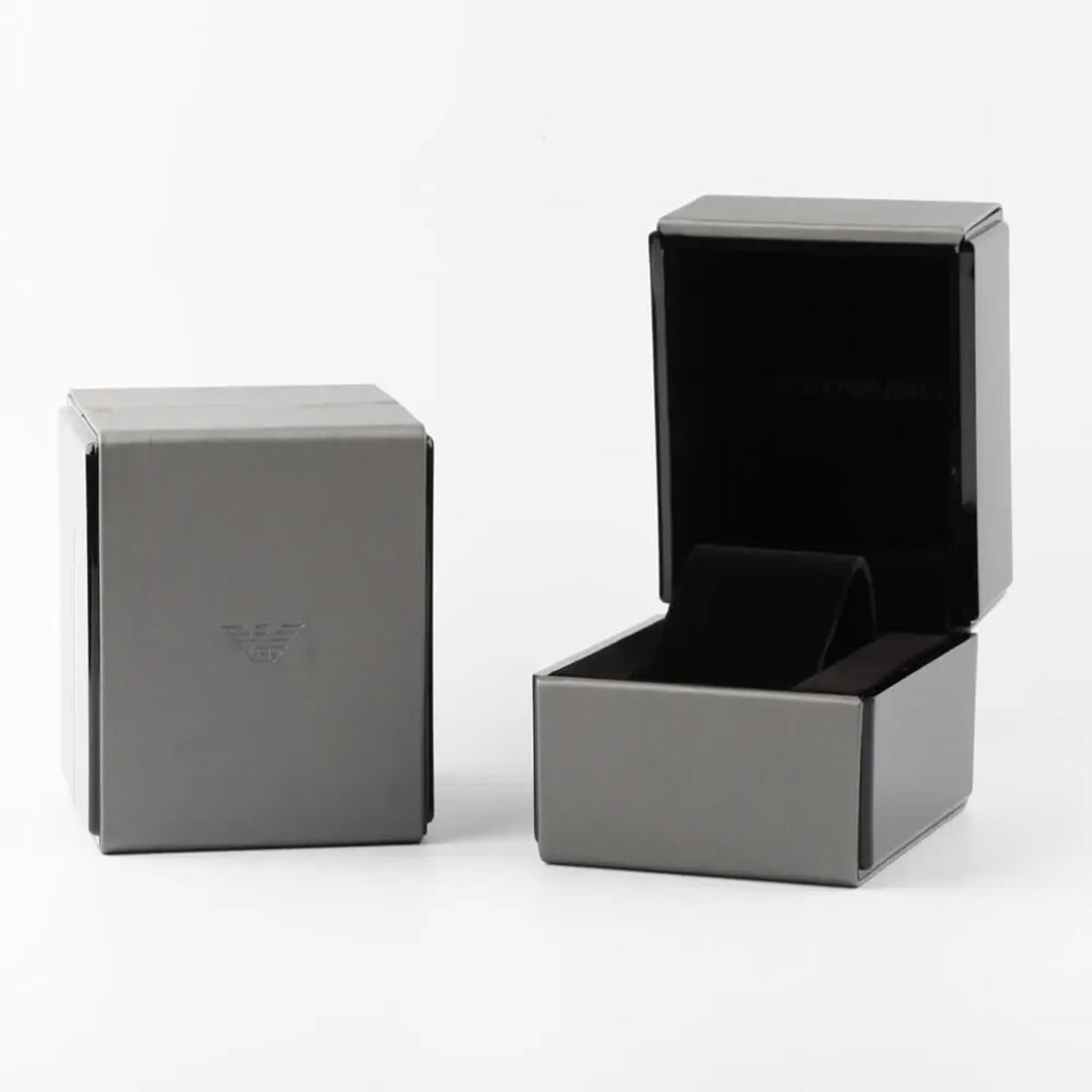Grey Emporio Armani watch presentation box set alongside its open display inner box