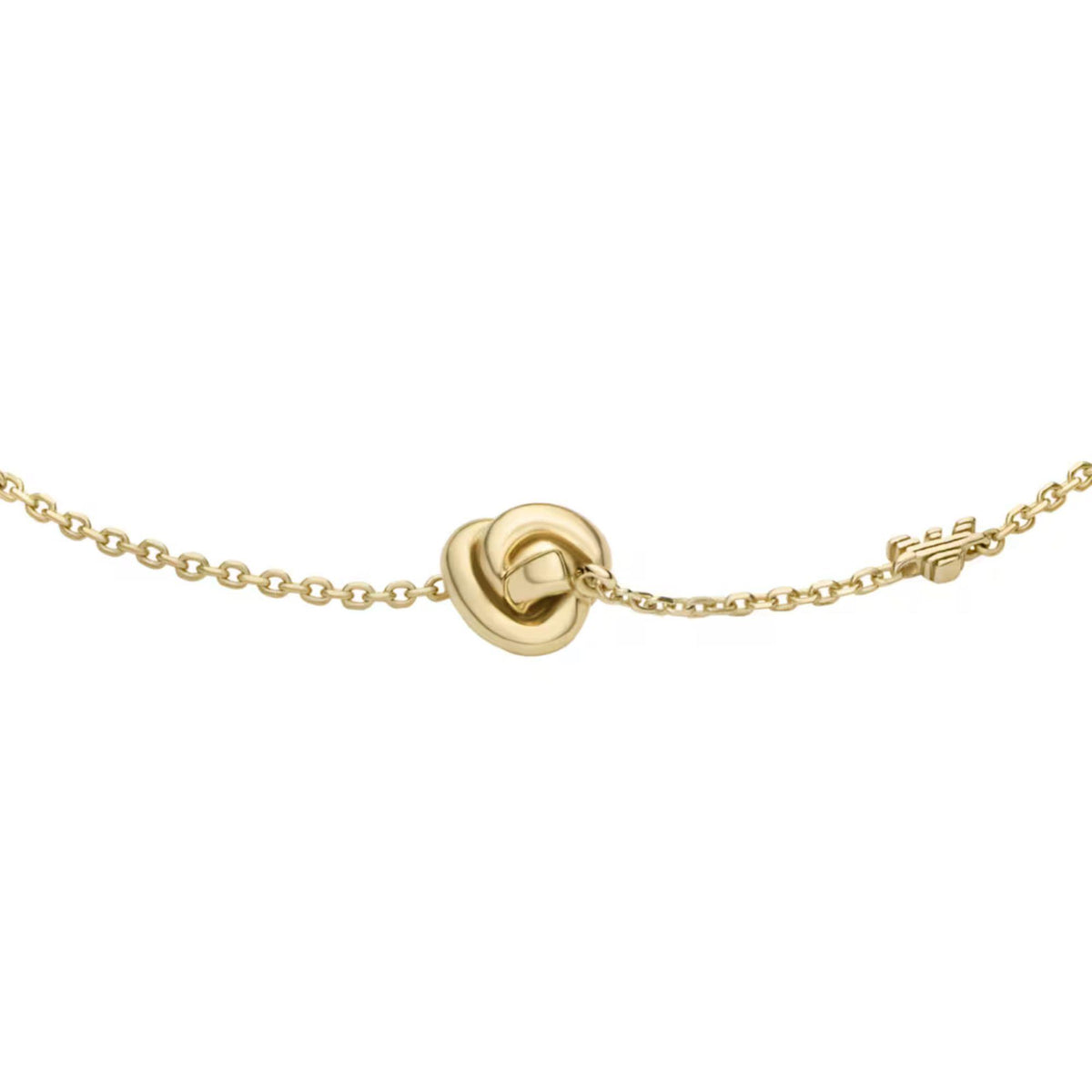 Gold-tone heart knot clasp bracelet detail with circular heart charm