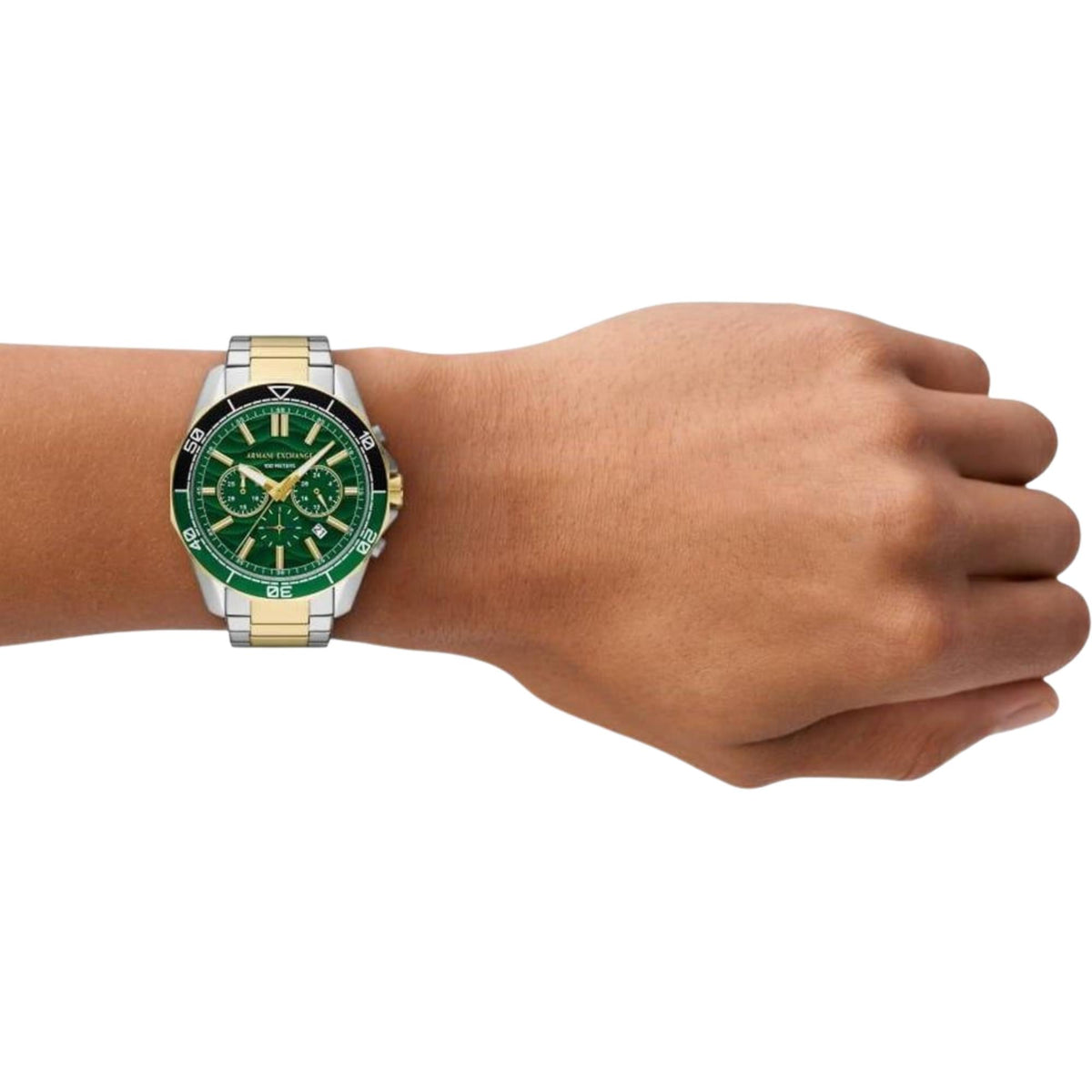 Men's green dial chronograph watch on wrist, steel bracelet with gold center links