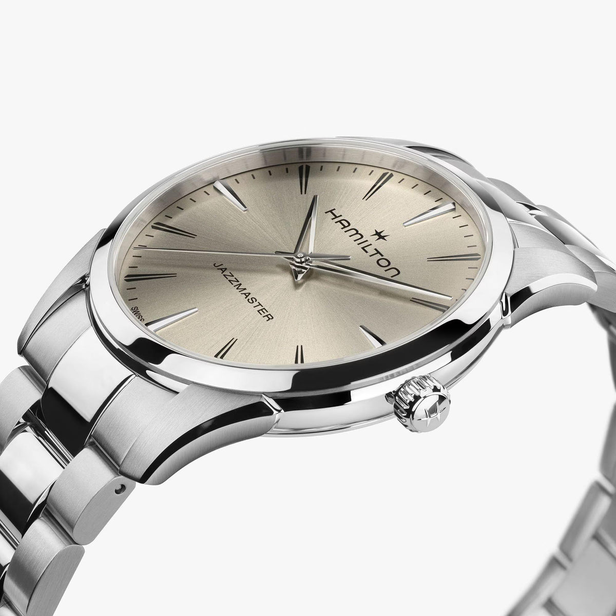 Hamilton Jazzmaster H32461121 quartz watch angled profile view displaying beige dial, textured crown, and metallic bezel