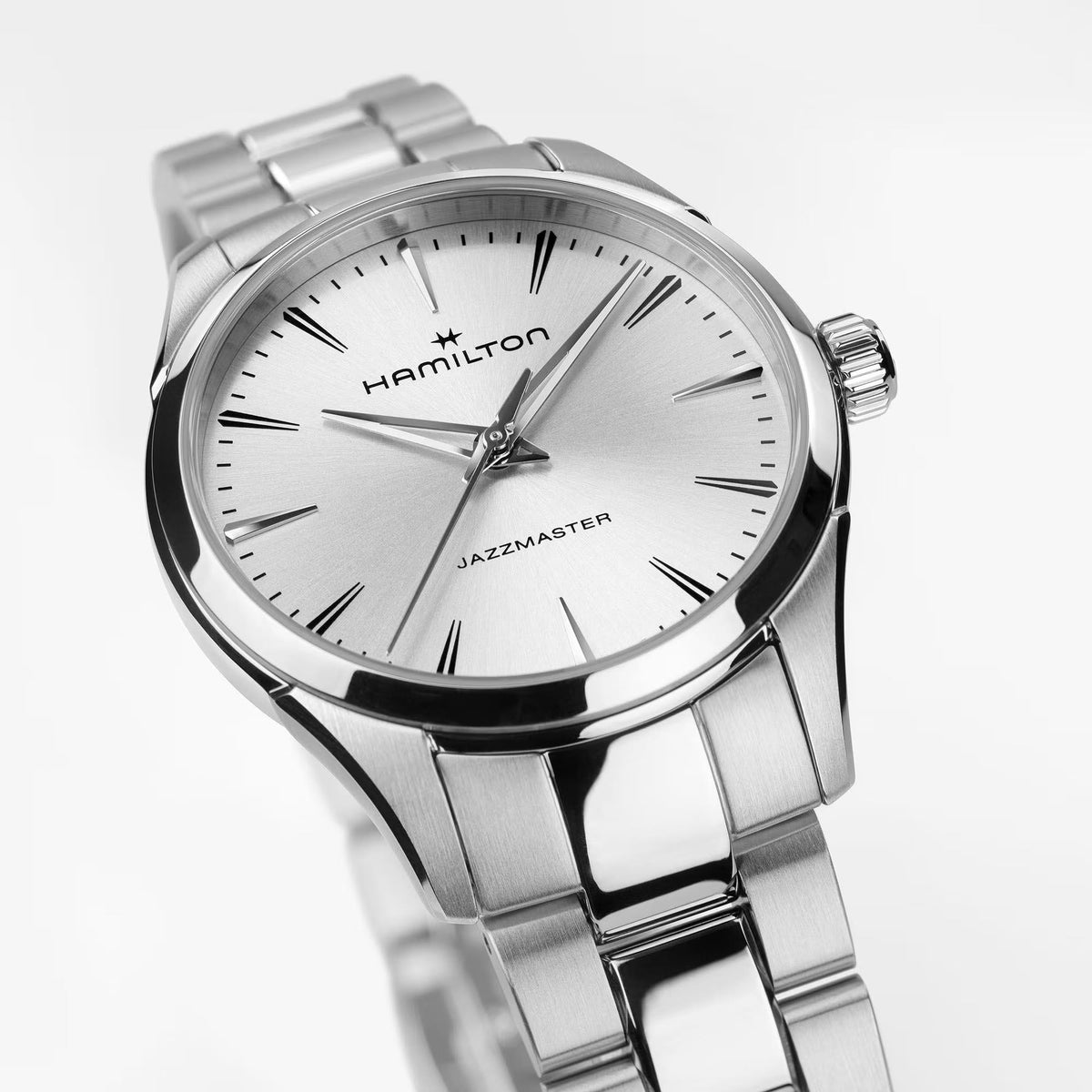 Hamilton Jazzmaster H32301181 close-up view of silver sunray dial with polished baton markers