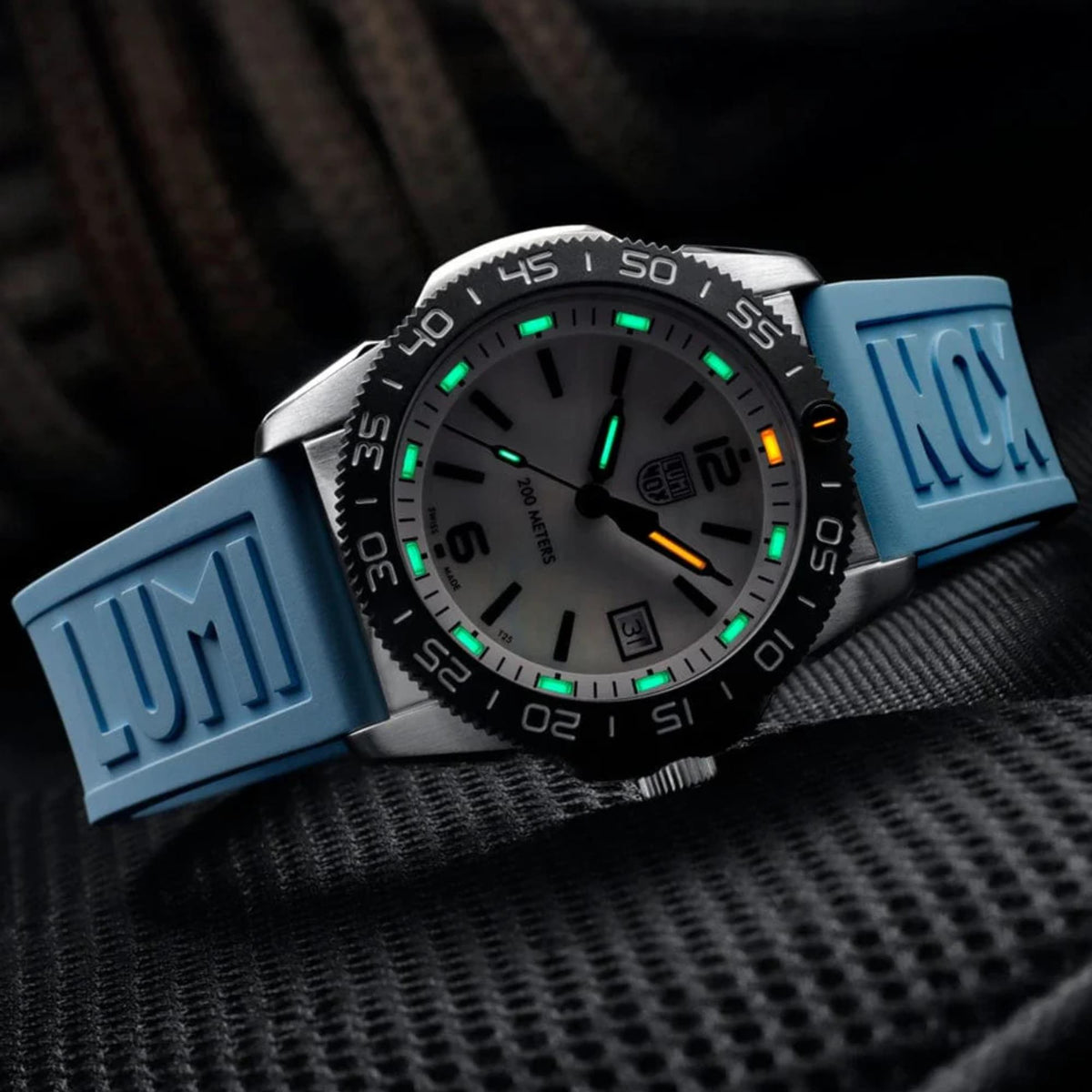 Luminox Pacific Diver XS.3124M angled low-light illumination view
