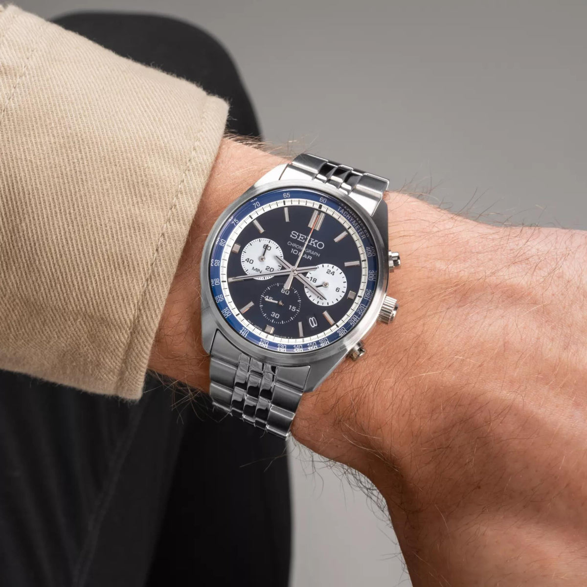 Seiko Essentials blue motorsport chronograph stainless steel watch on wrist