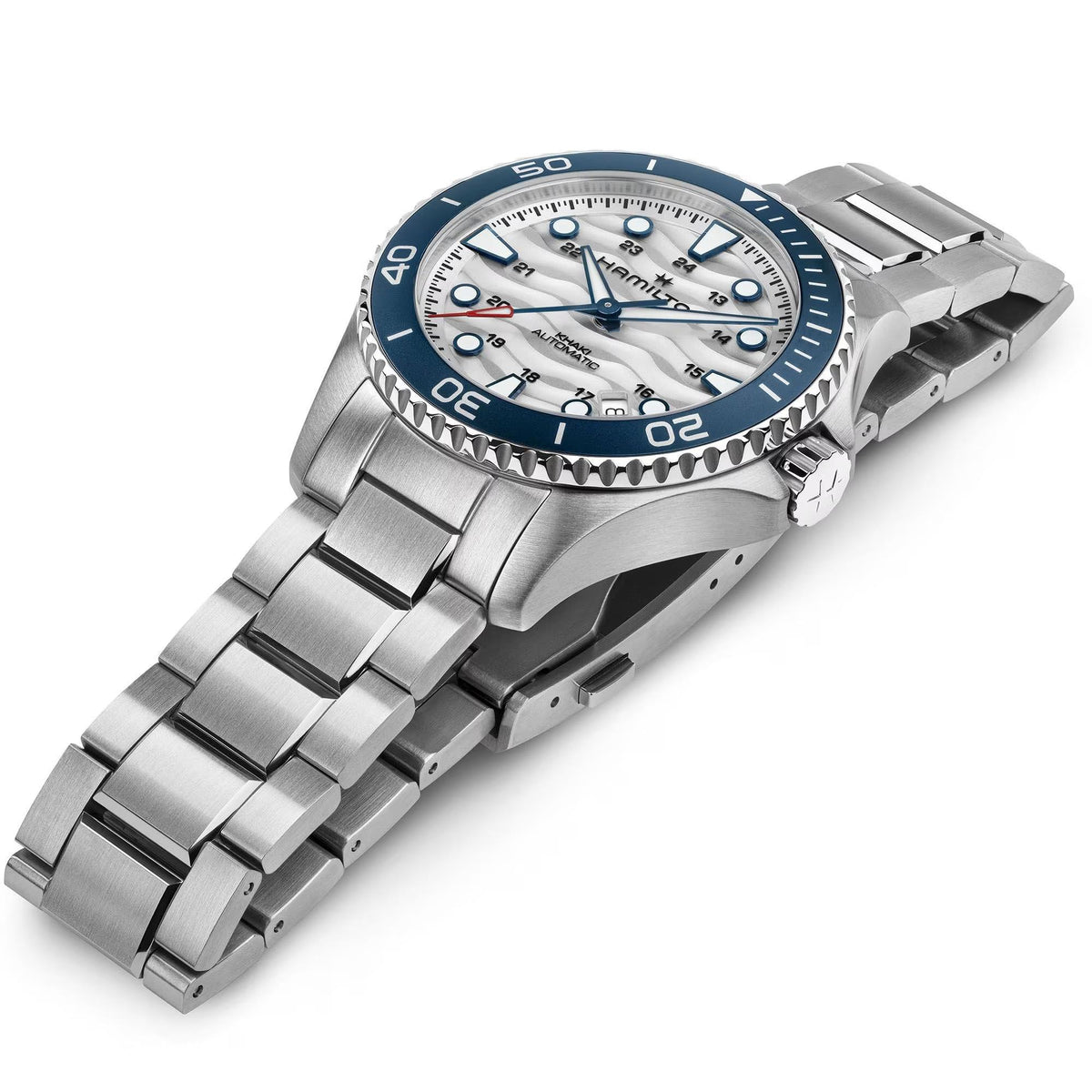 Angle view of Hamilton Khaki Navy Scuba H82425110 showcasing its brushed metal link strap and blue bezel ring
