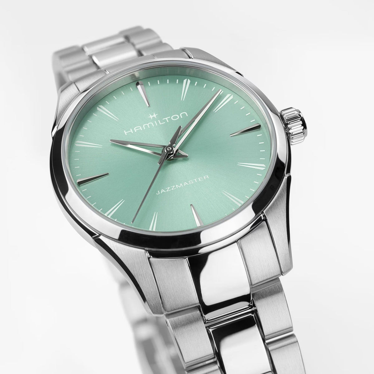Hamilton Jazzmaster quartz watch close-up with light green dial and silver hands