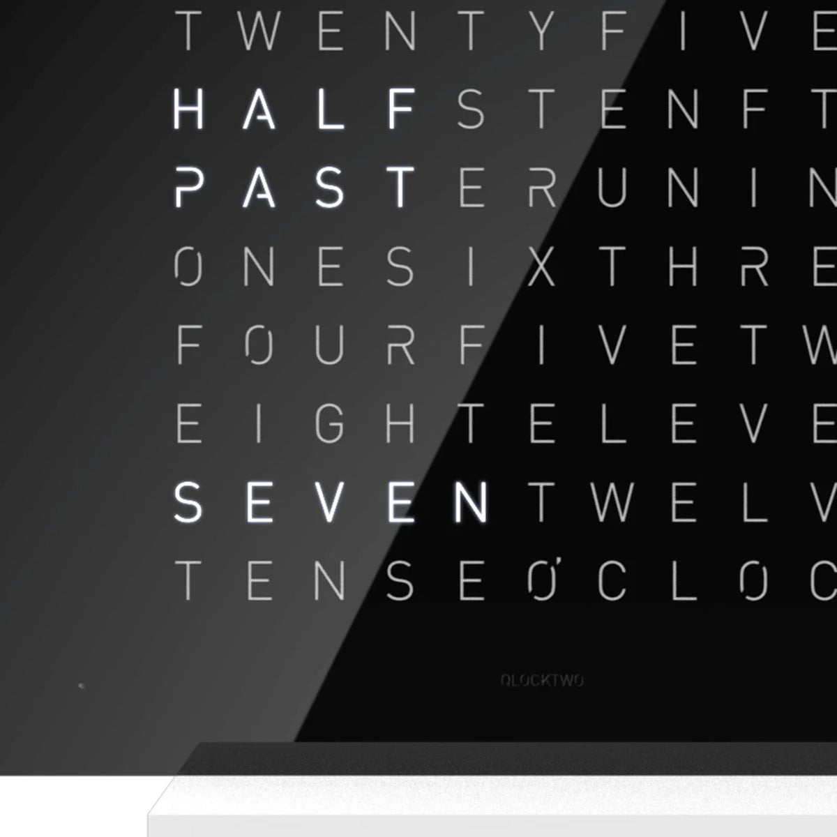 QLOCKTWO word clock close-up showing white time letters on black face