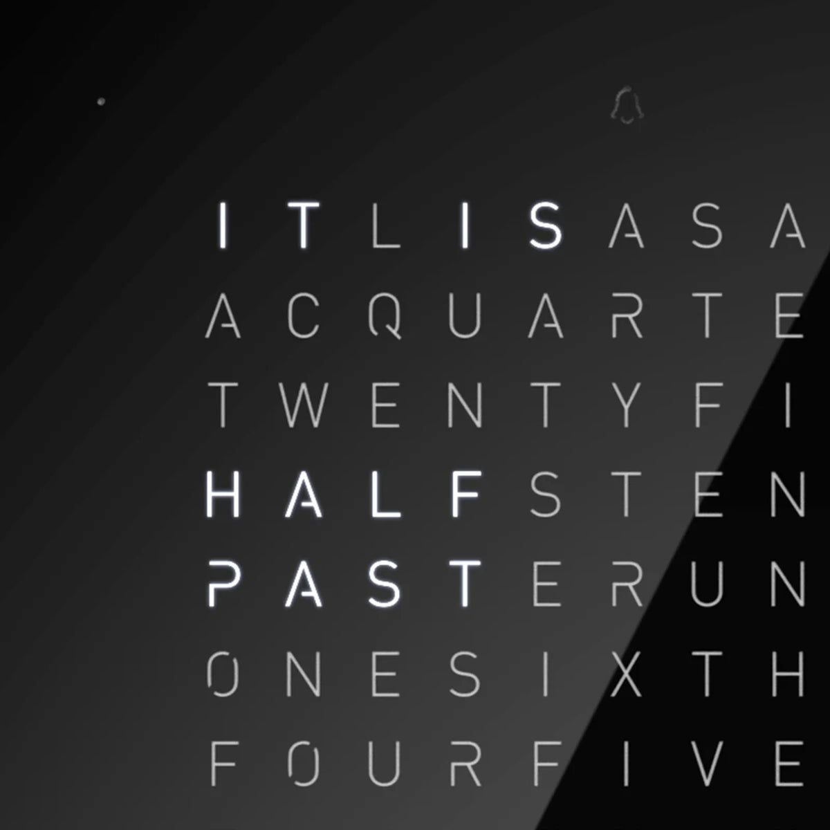 QLOCKTWO word clock close-up of white time letters on pure black panel