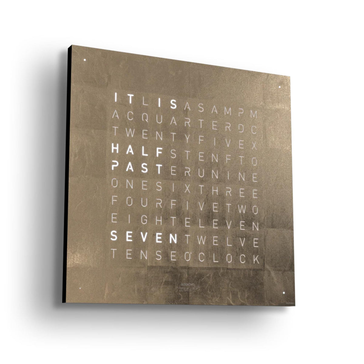 Square gold wall clock with English word numerals, mounted in a dark frame