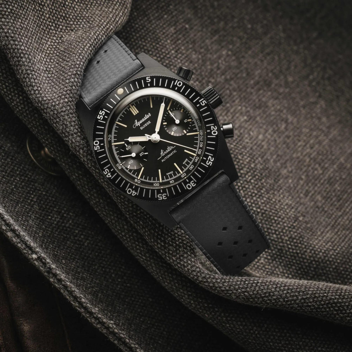Men's Aquastar chronograph watch with black dial and perforated black strap