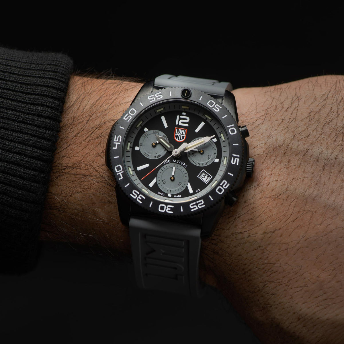 Luminox Pacific Diver chronograph watch on wrist, black dial, dark rubber band