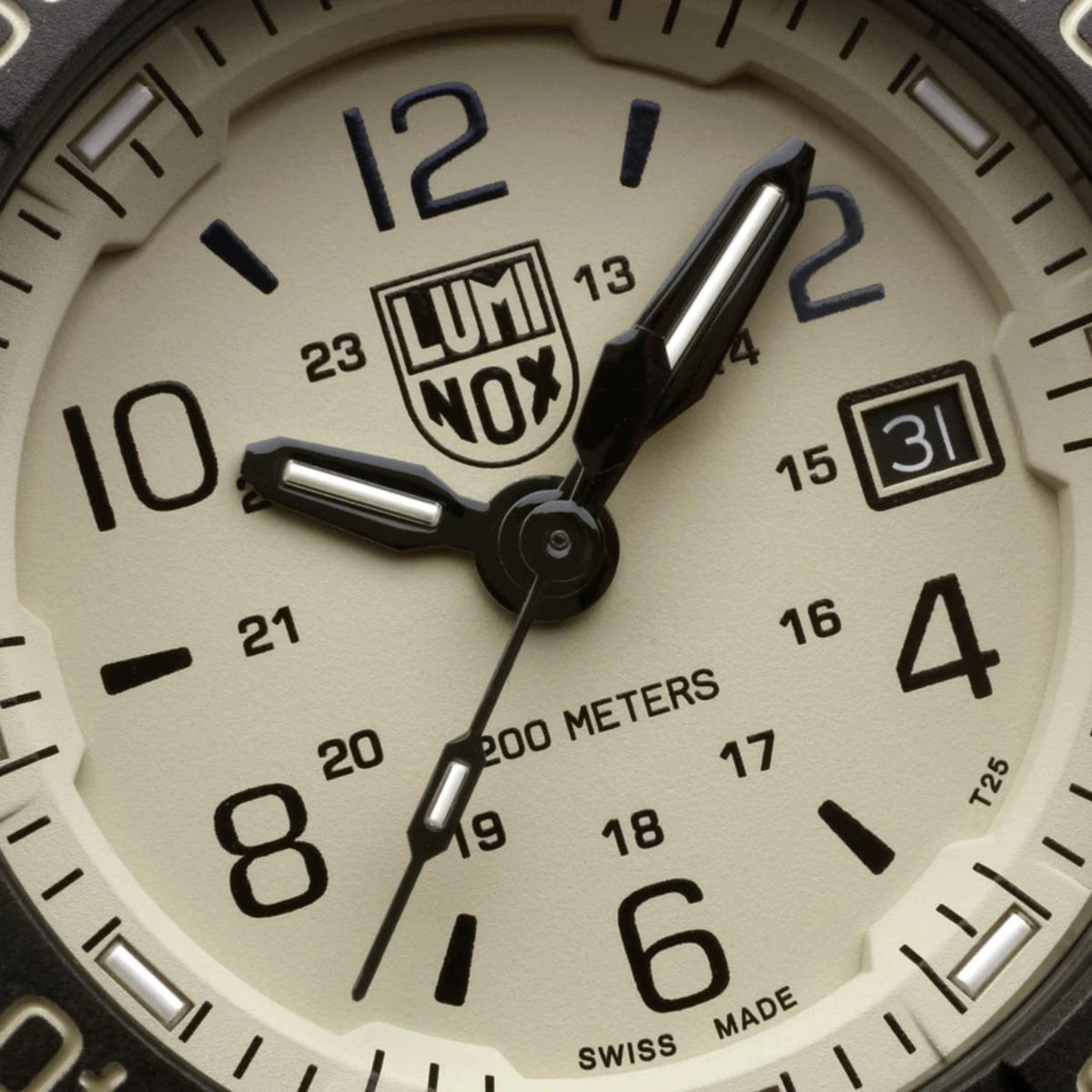 Quartz dive watch close-up: sand dial with LUMINOX logo and date window