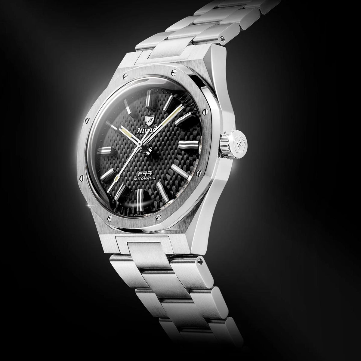 Nivada Grenchen F77 69000A77 stainless steel case angled side view