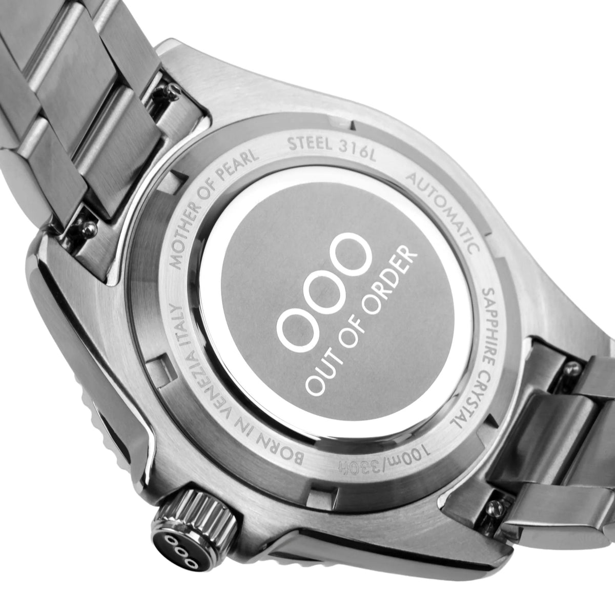 Steel caseback with 'OUT OF ORDER' and '100mm/33FT WATER RESISTANT' text