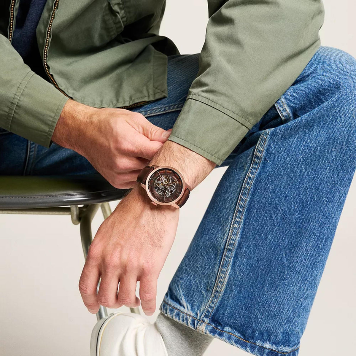 Fossil Townsman ME3259 on-wrist lifestyle view showing the brown dial and rose gold-tone case