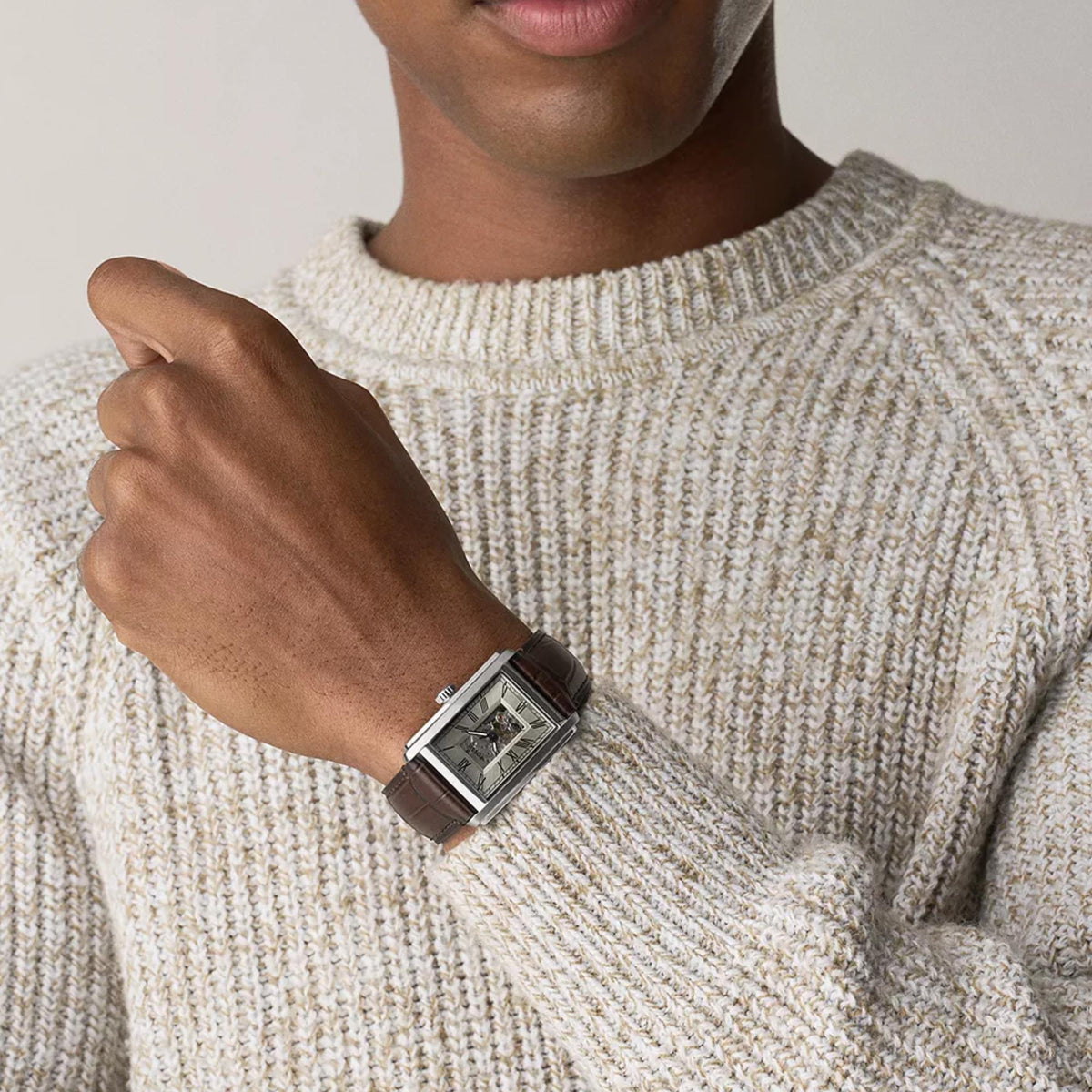 Fossil Carraway ME3272 worn on a wrist showing the watch with a beige knit sweater