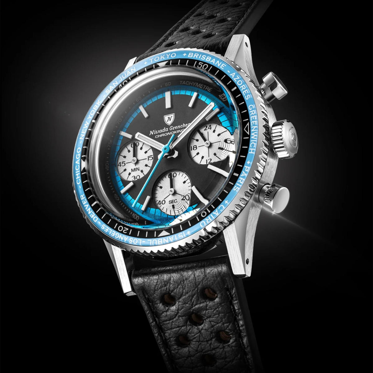 Nivada Grenchen Chronoking watch 87053Q10 with a stainless steel case, black dial, bright blue bezel and hands, and a black leather strap, shown on a dark background.