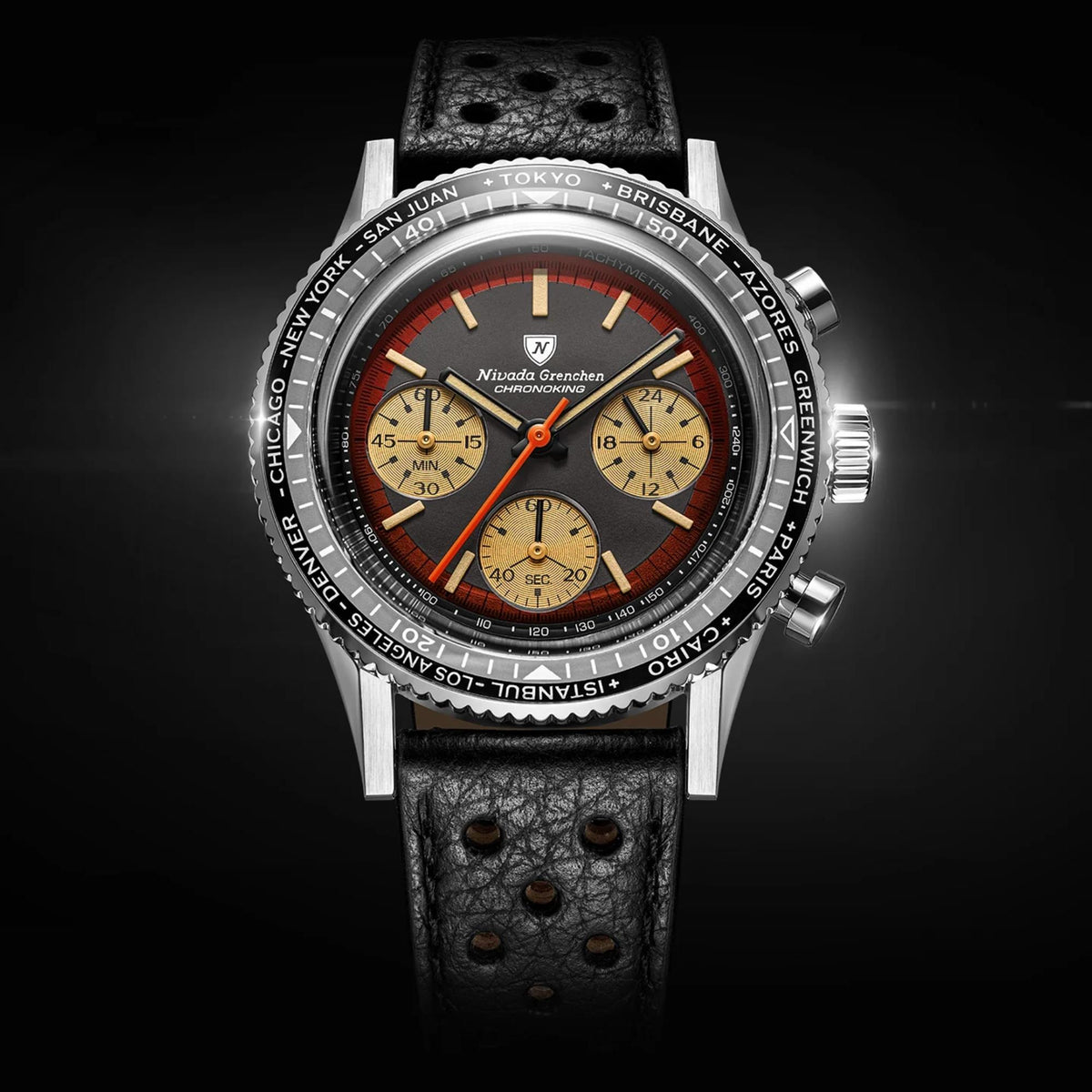 Nivada Grenchen Chronoking 87055Q10 chronograph watch featuring a stainless steel case, a black textured leather strap, and a 38mm dial with beige sub-dials, a red accent ring, and an orange second hand