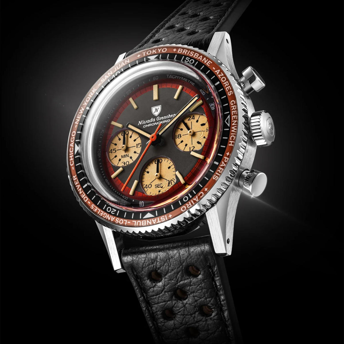 Angled close-up of a Nivada Grenchen Chronoking watch showcases a copper-toned city bezel paired with a black leather racing strap