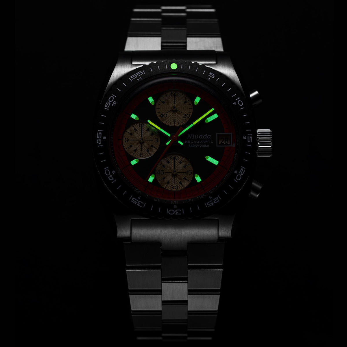 Nivada Grenchen Autochron Mecaquartz 77004Q45 mens wristwatch highlighting green illuminated hands and hour markers in a dark setting
