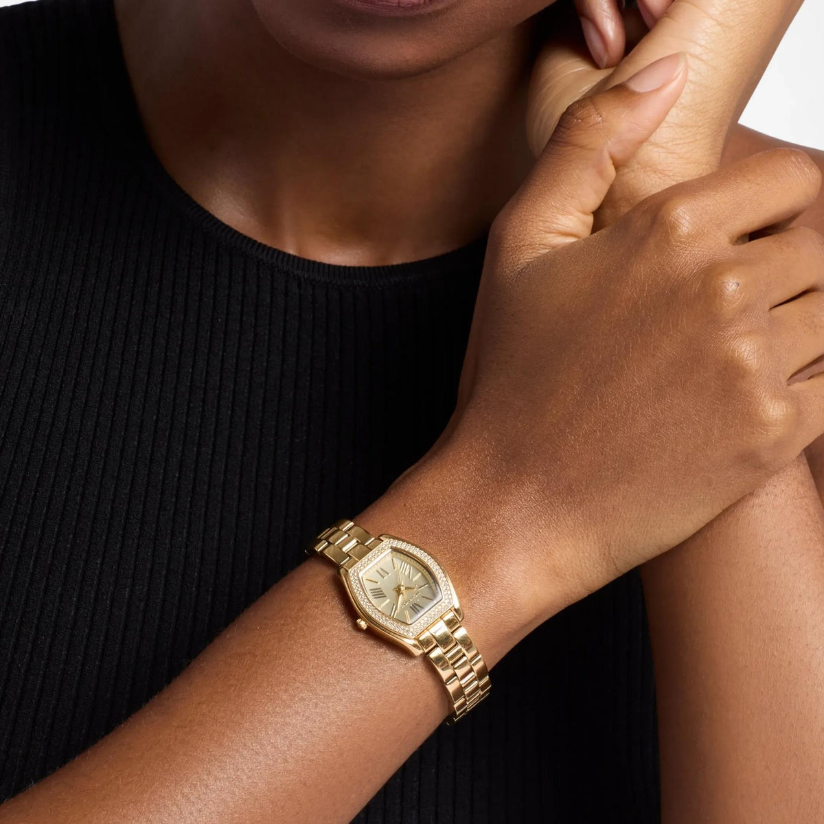 Michael Kors Petite Chelsea Pavé 25mm MK7618 womens quartz watch model shot view displaying the crystal-embellished gold-tone watch worn on wrist