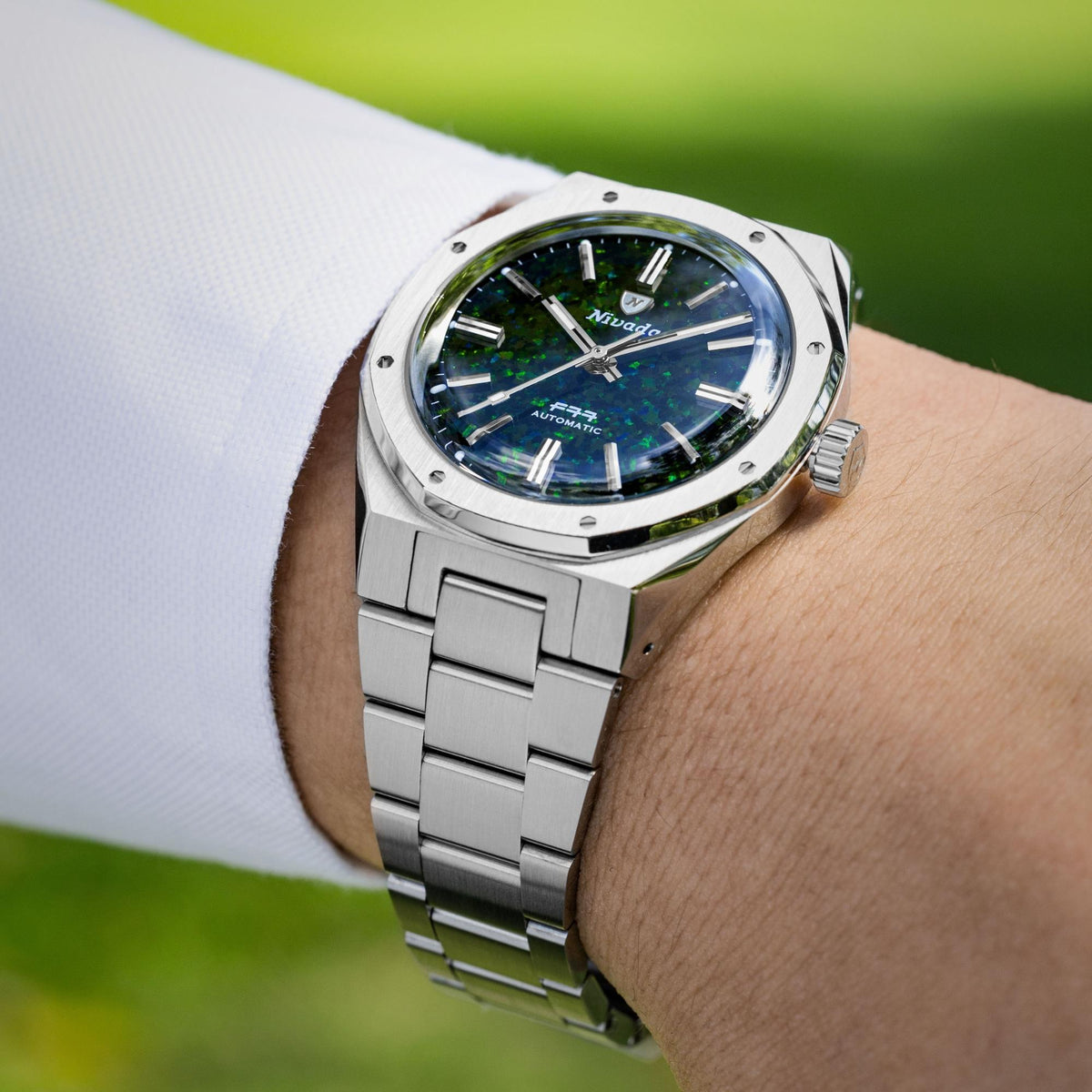 Nivada Grenchen F77 MK2 68062A77 wrist view showing mens automatic watch with black opal dial