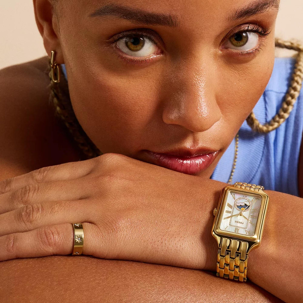 Fossil Raquel ES5398 lifestyle shot showing 29mm rectangular mother of pearl dial ladies watch worn on wrist