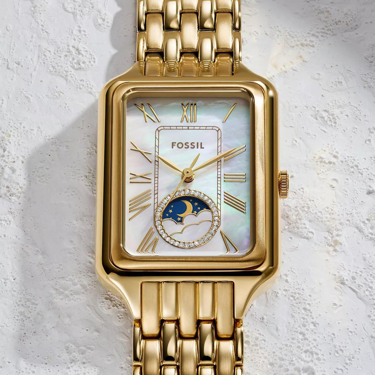Fossil Raquel ES5398 close-up view highlighting rectangular mother of pearl dial with sun and moon indicator display
