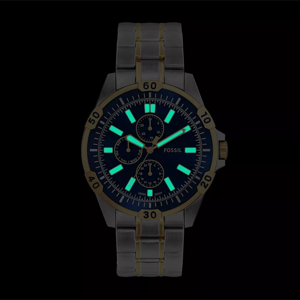 Fossil Garrett FS6146 illuminated view showcasing luminous hands and markers on blue dial