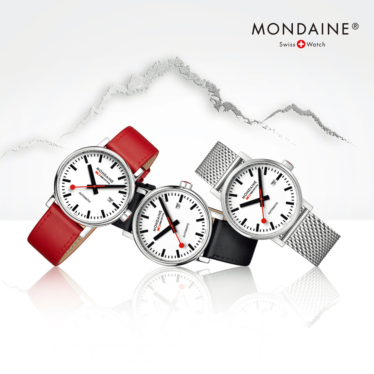 Three Mondaine Automatic watches with red leather, black leather, and mesh metal straps against Swiss mountain outline