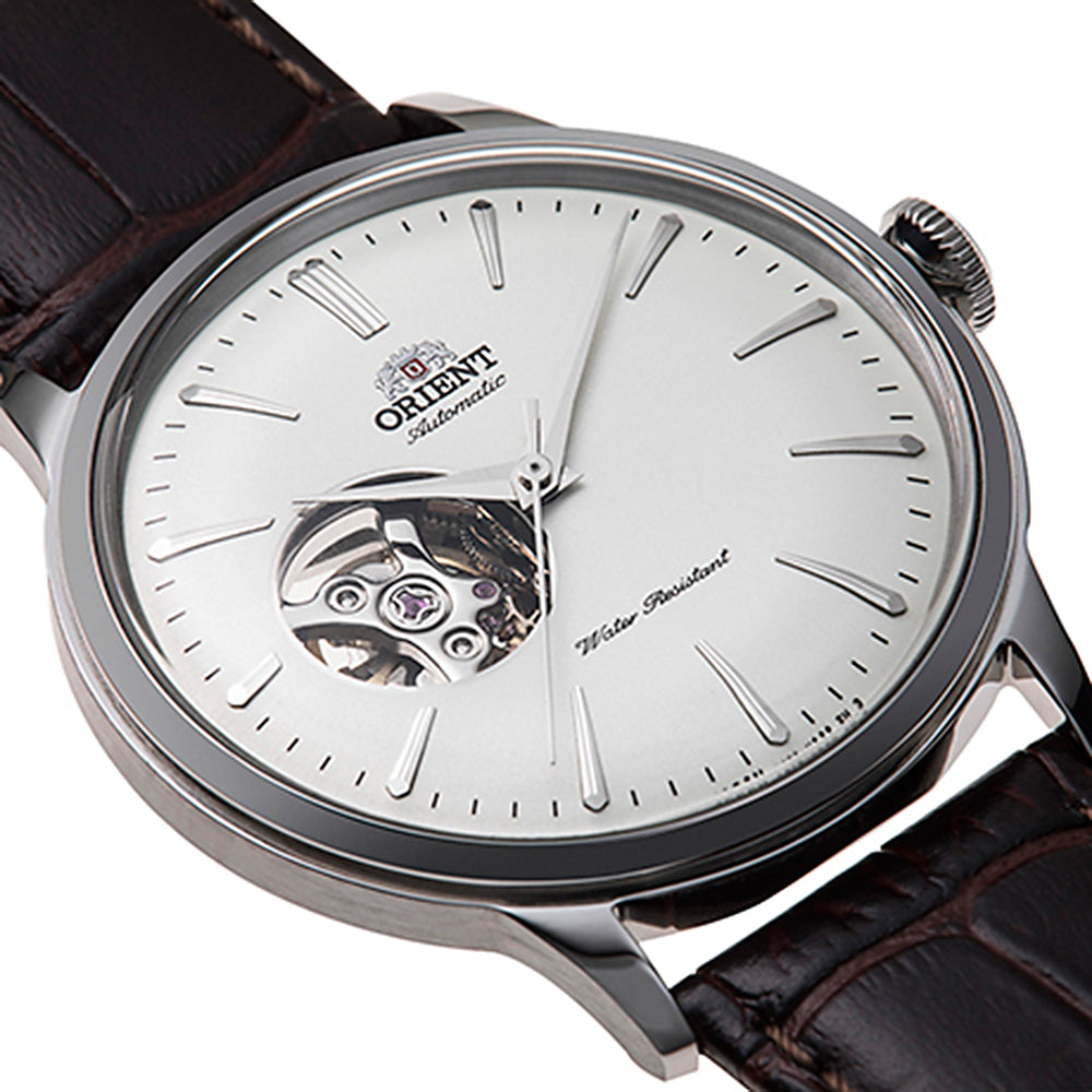 Orient Bambino watch close-up: white dial with open-heart skeleton movement window