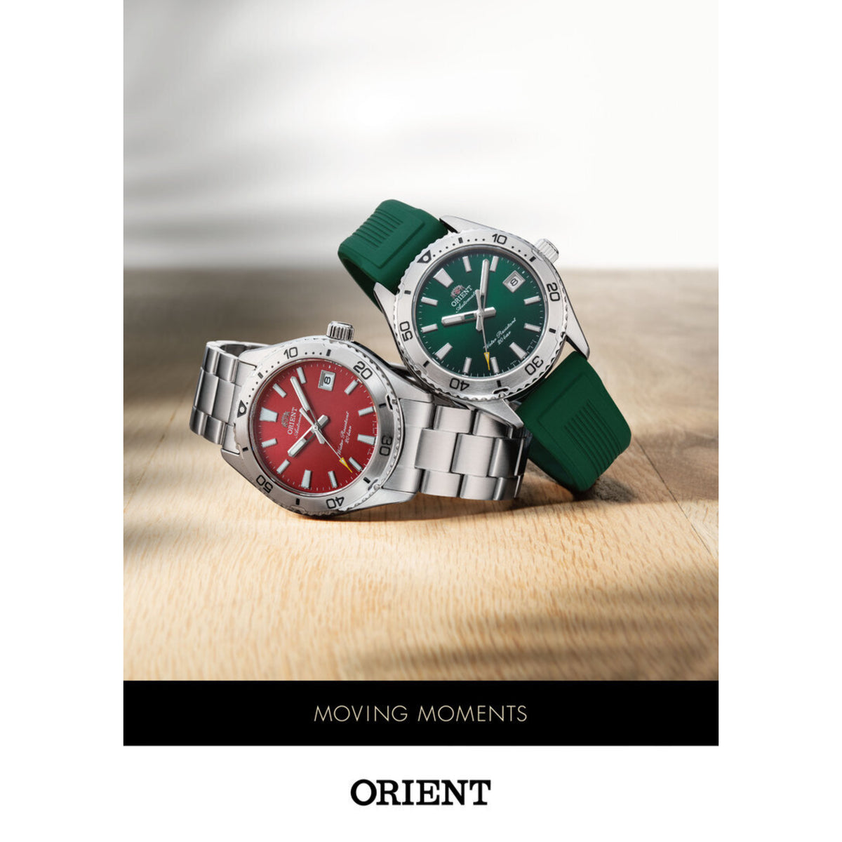 Two Orient Mako automatic dive watches, one with a red dial and steel bracelet, and another with a green dial and green rubber strap