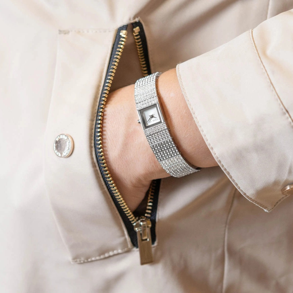 Michael Kors Darrington MK4886 lifestyle shot featuring 14.5mm white dial ladies quartz watch worn on wrist