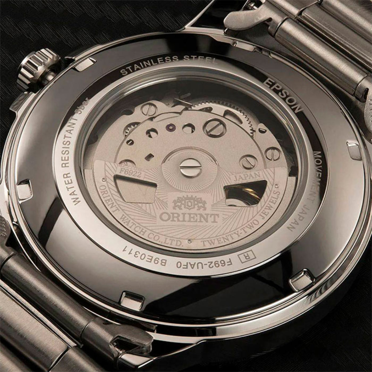 Close-up of Orient Contemporary RA-AA0C01B39B transparent case back exposing internal mechanical movement