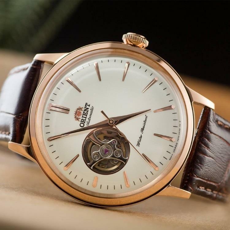 Automatic open-heart watch with white dial, rose gold case, brown leather strap