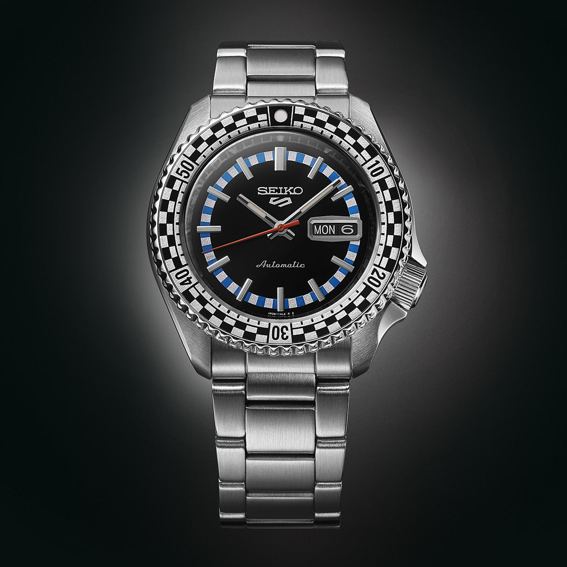 Seiko 5 Sports SRPK67K1 front view on dark gradient background
