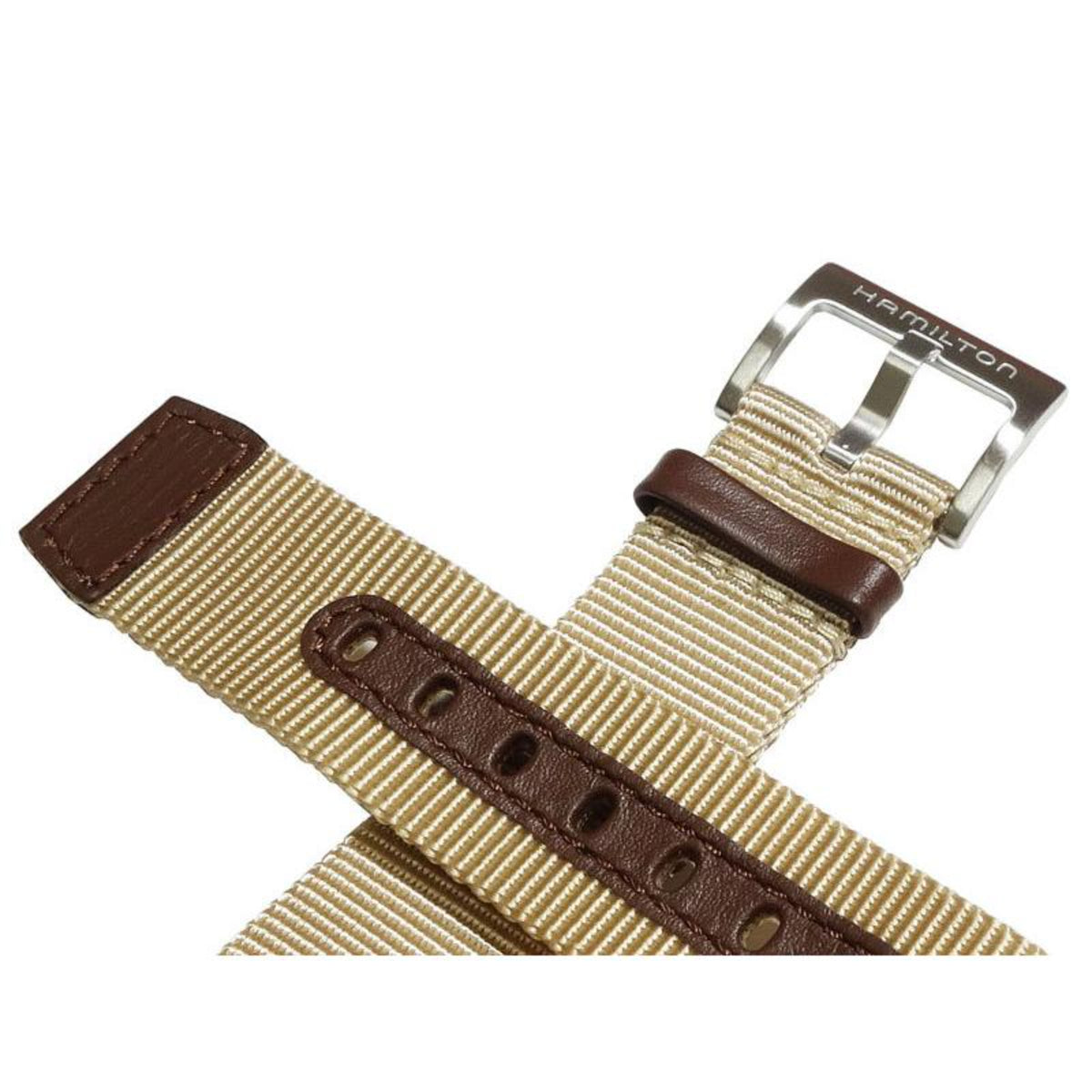 Close-up view of Hamilton Khaki Field H690694103 showing durable woven nylon texture, leather pin-hole strip, and engraved brand logo