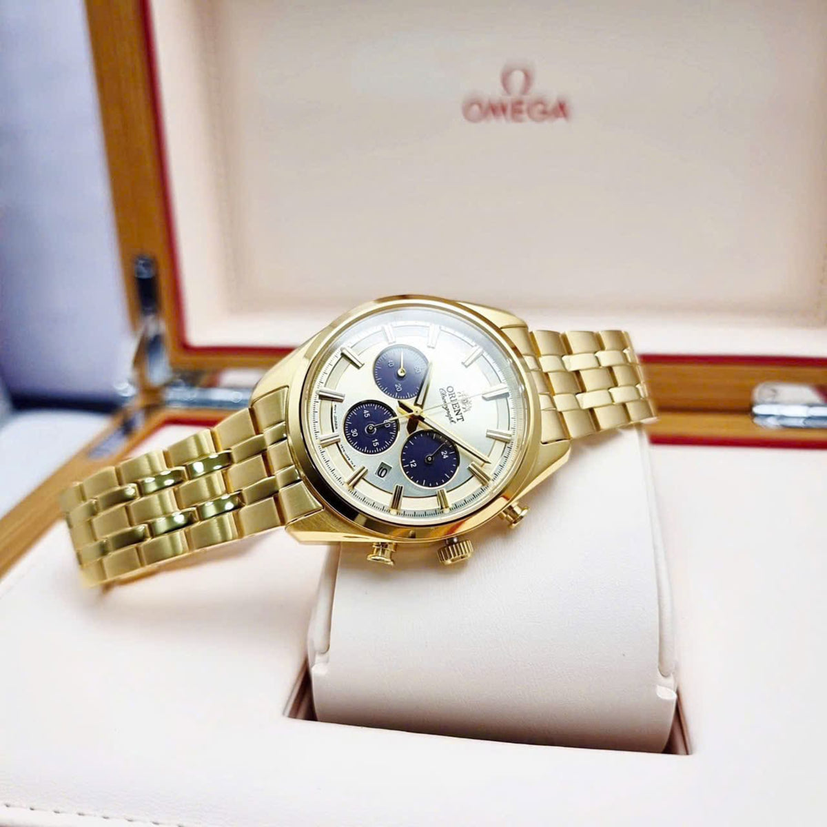 Men's solar chronograph watch with gold-tone case and champagne dial
